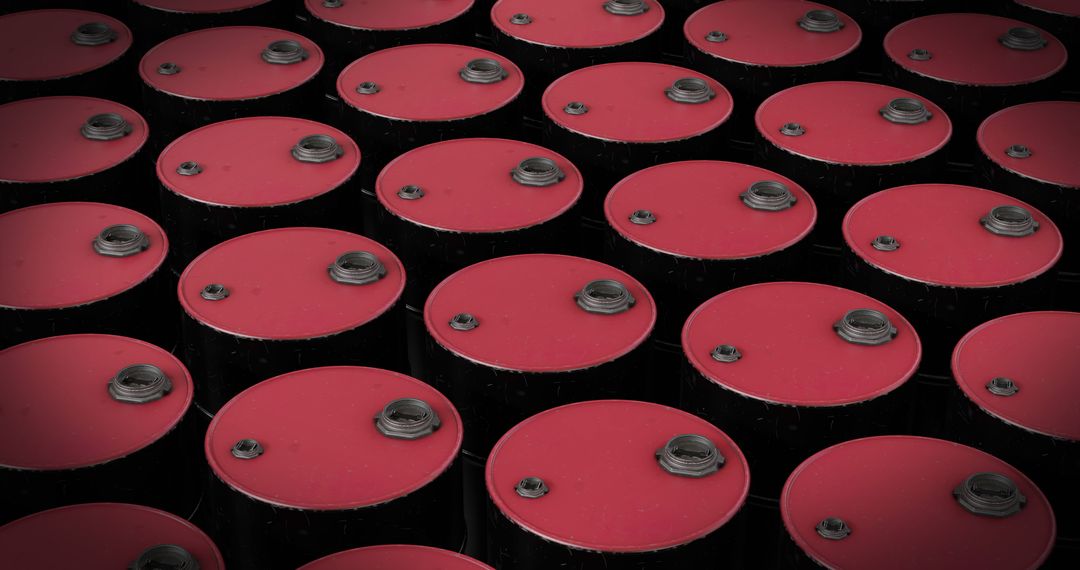 Multiple Red Barrels Stacked in Storage Area