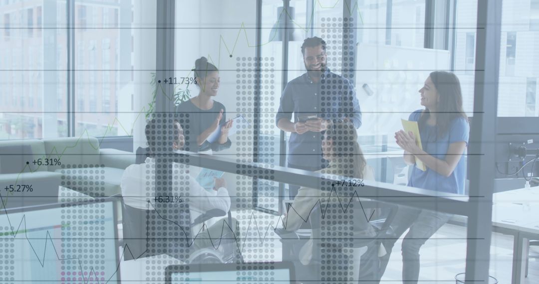 Collaborative Team Analyzing Business Data in Modern Office