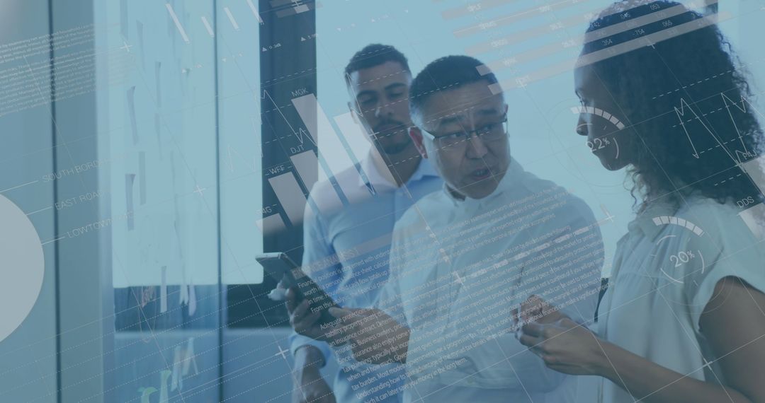 Business Professionals Analyzing Data Through Digital Interface