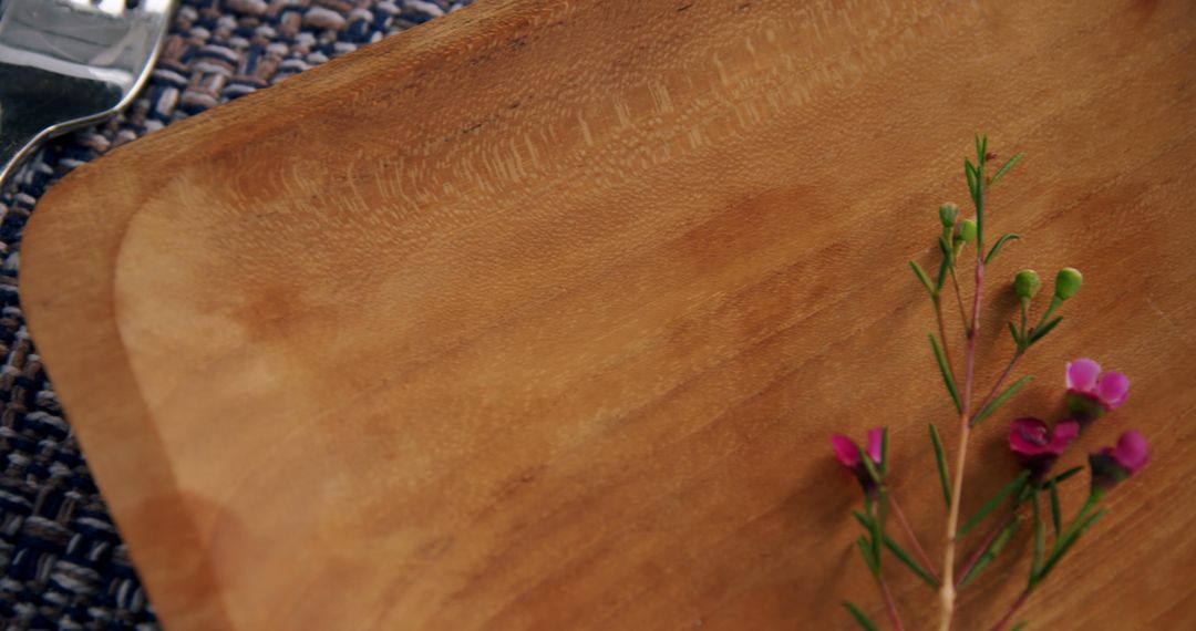 Rustic Wooden Platter with Flowers on Woven Placemat - Free Images, Stock Photos and Pictures on Pikwizard.com