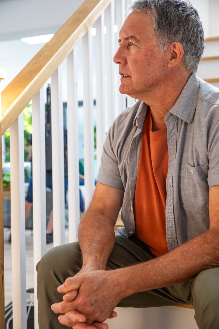 Senior Man Enjoying Tranquil Moment at Home