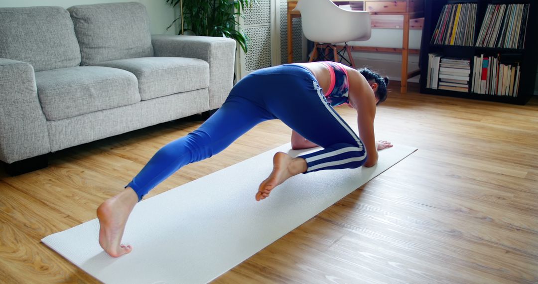 Woman Practicing Yoga in Cozy Living Room - Free Images, Stock Photos and Pictures on Pikwizard.com