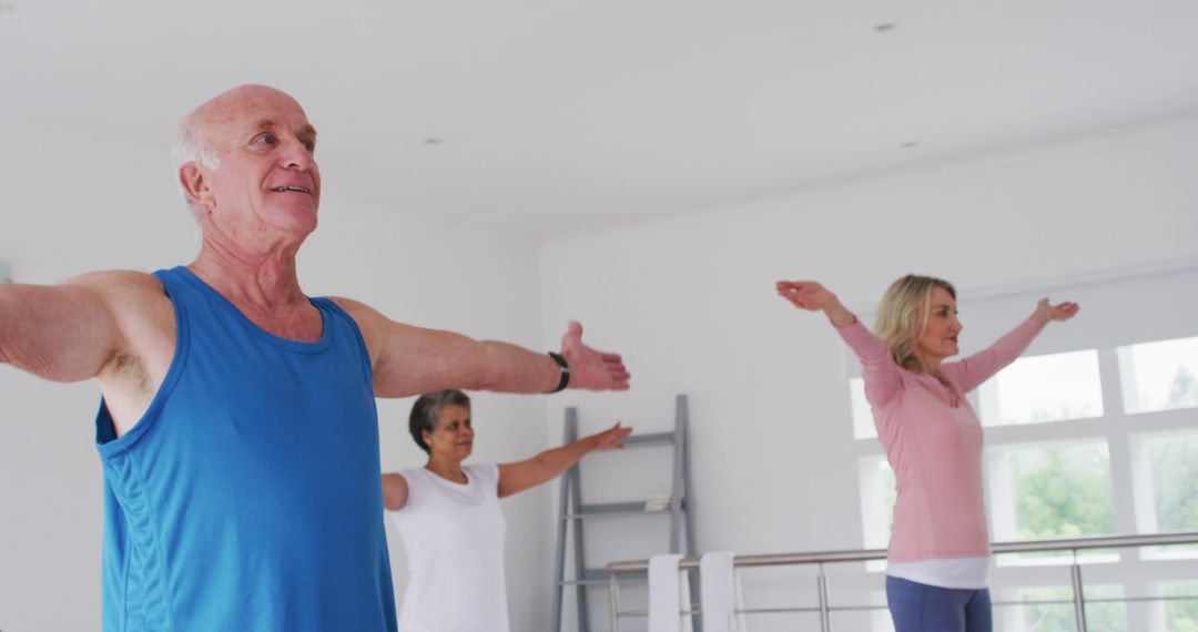 Active Seniors Practicing Yoga in Bright Studio - Free Images, Stock Photos and Pictures on Pikwizard.com