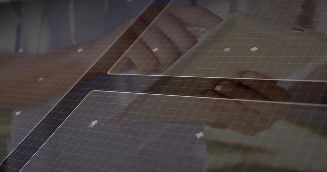 Interacting with transparent touchscreen interface over tablet display with grid overlay