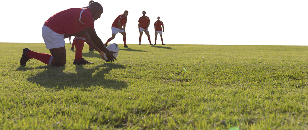 Transparent Rugby Player in Red Preparing for Goal on Green Field