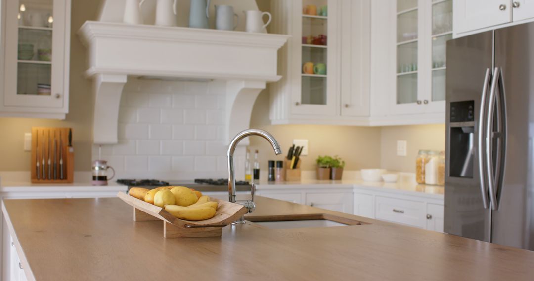 Modern Kitchen with Wooden Island and Fruit Display