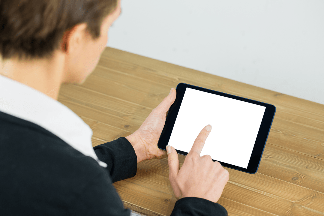 Businesswoman Interacting with Transparent Tablet Screen at Work Desk