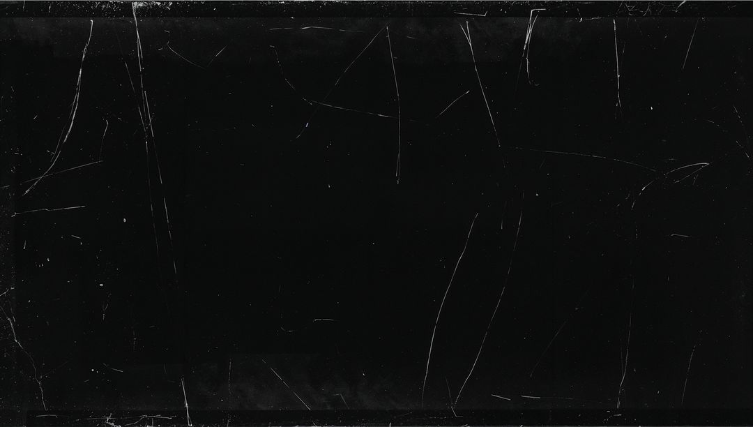 Minimalist Worn Black Panel Texture with Fine Scratches, Dust Specks and Subtle Streaks