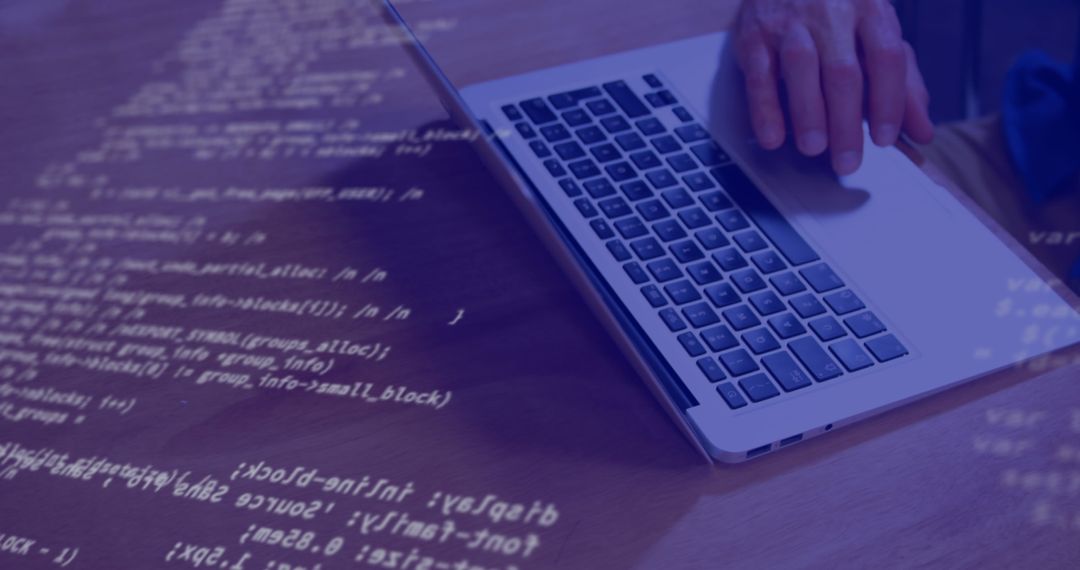 Coding on Laptop with Digital Data Overlay
