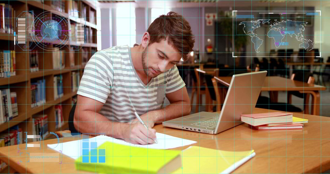 Male Student Studying and Writing Notes in Library Using Laptop with Futuristic HUD Overlay