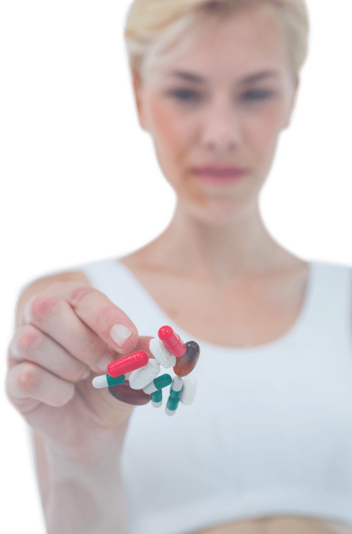 Transparent Focus on Woman Disposing Mix of Capsules