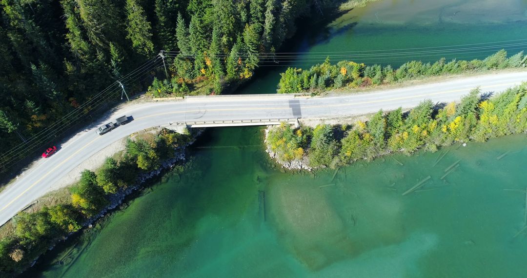 Aerial View of Highway Bridge Over Forest River in Summer - Free Images, Stock Photos and Pictures on Pikwizard.com