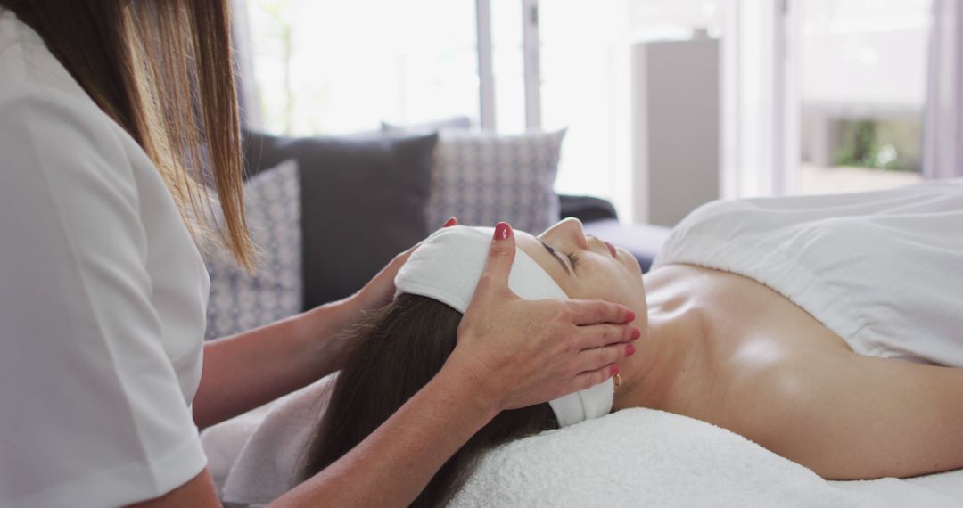 Woman Receiving Relaxing Head Massage in Spa - Free Images, Stock Photos and Pictures on Pikwizard.com