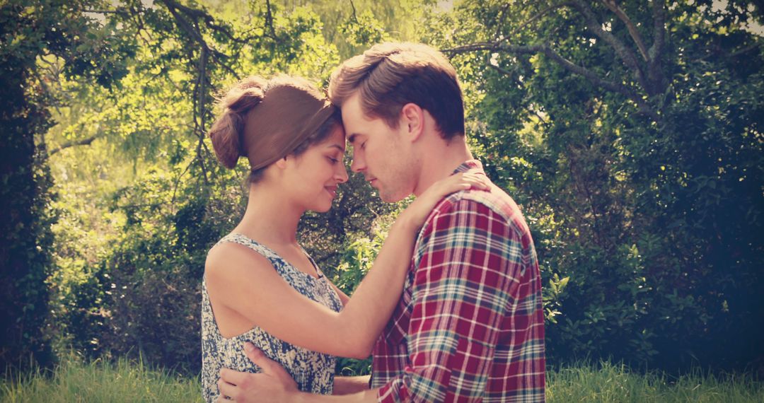 Young Couple Embracing Outdoors with Affectionate Connection