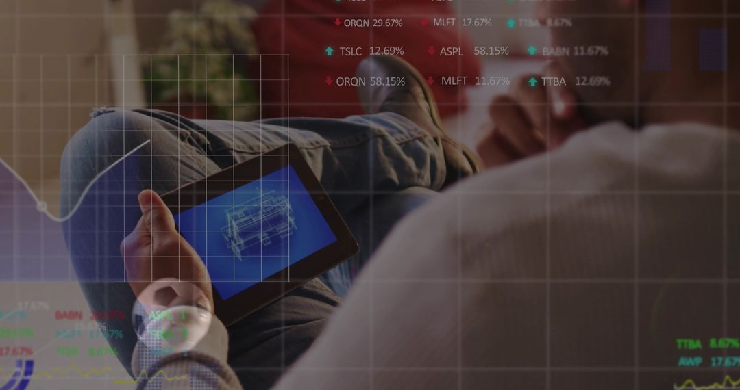 Man Relaxing on Sofa with Digital Tablet Showing Business Charts