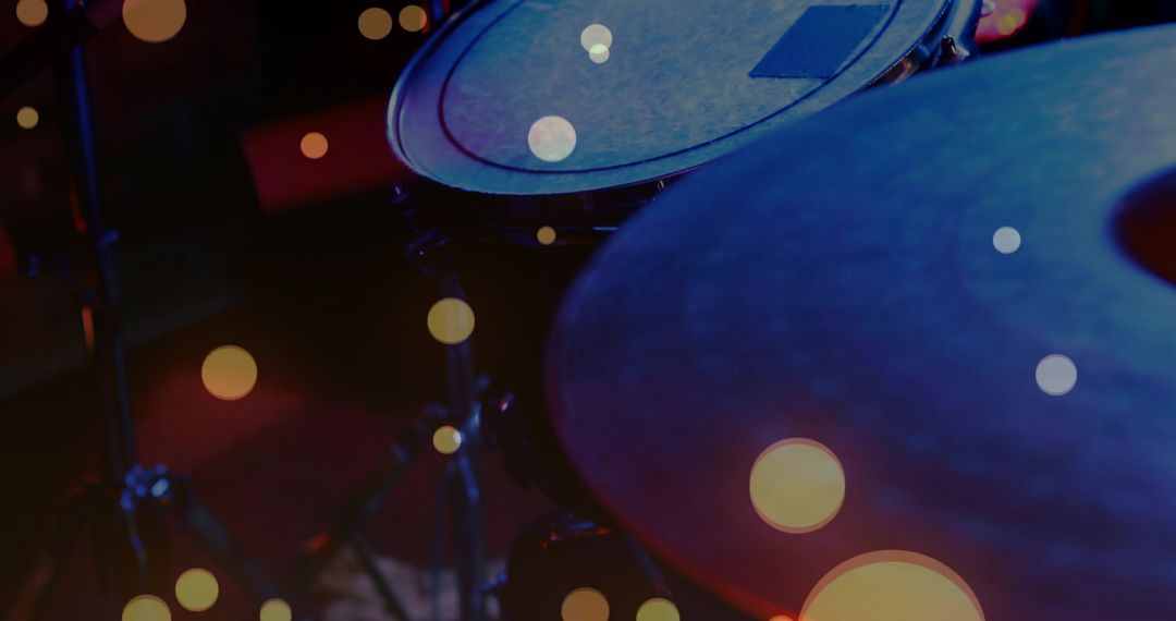 Drum Kit with Warm Bokeh Lights on Dim Stage