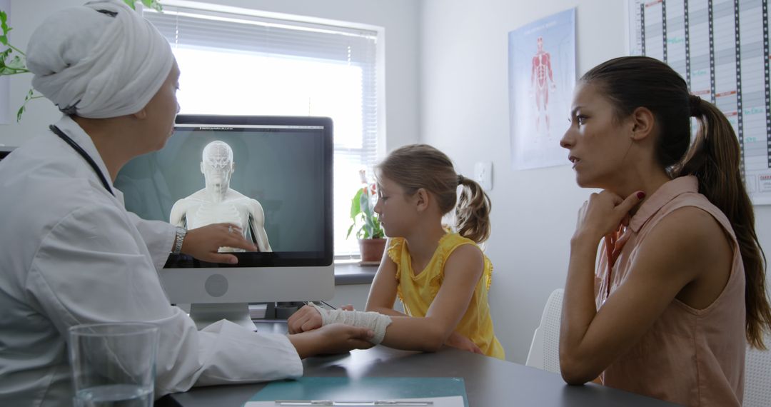 Female Doctor Discussing Diagnosis with Mother and Daughter in Medical Office - Free Images, Stock Photos and Pictures on Pikwizard.com