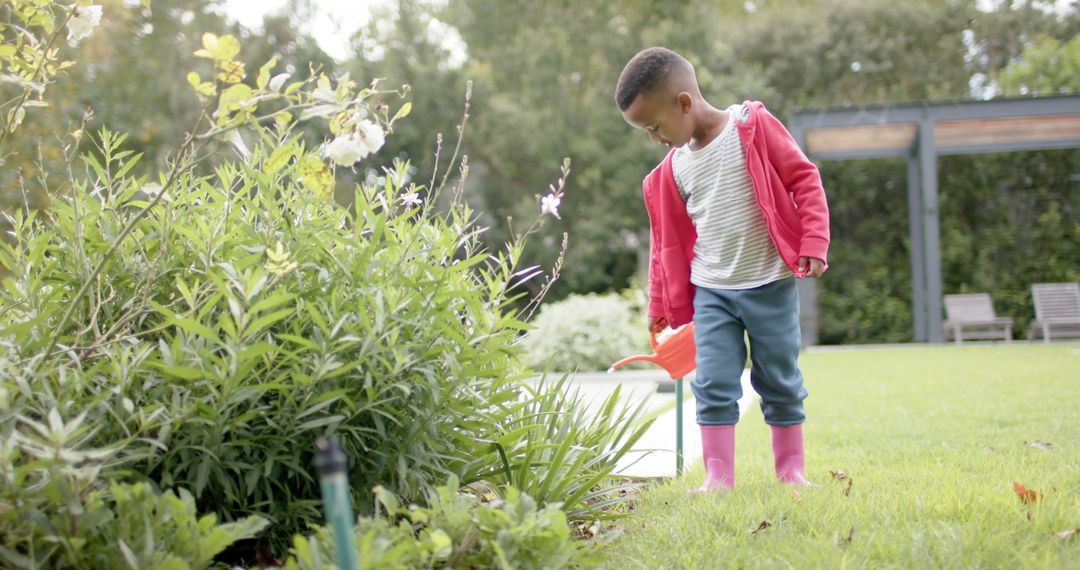 Young Boy Engaging in Gardening Activity Outdoors - Free Images, Stock Photos and Pictures on Pikwizard.com