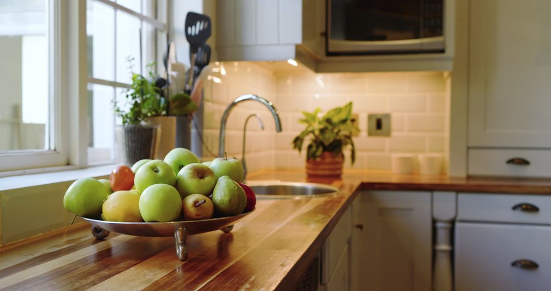 Wooden Kitchen Countertop with Fresh Apples in Rustic Setting