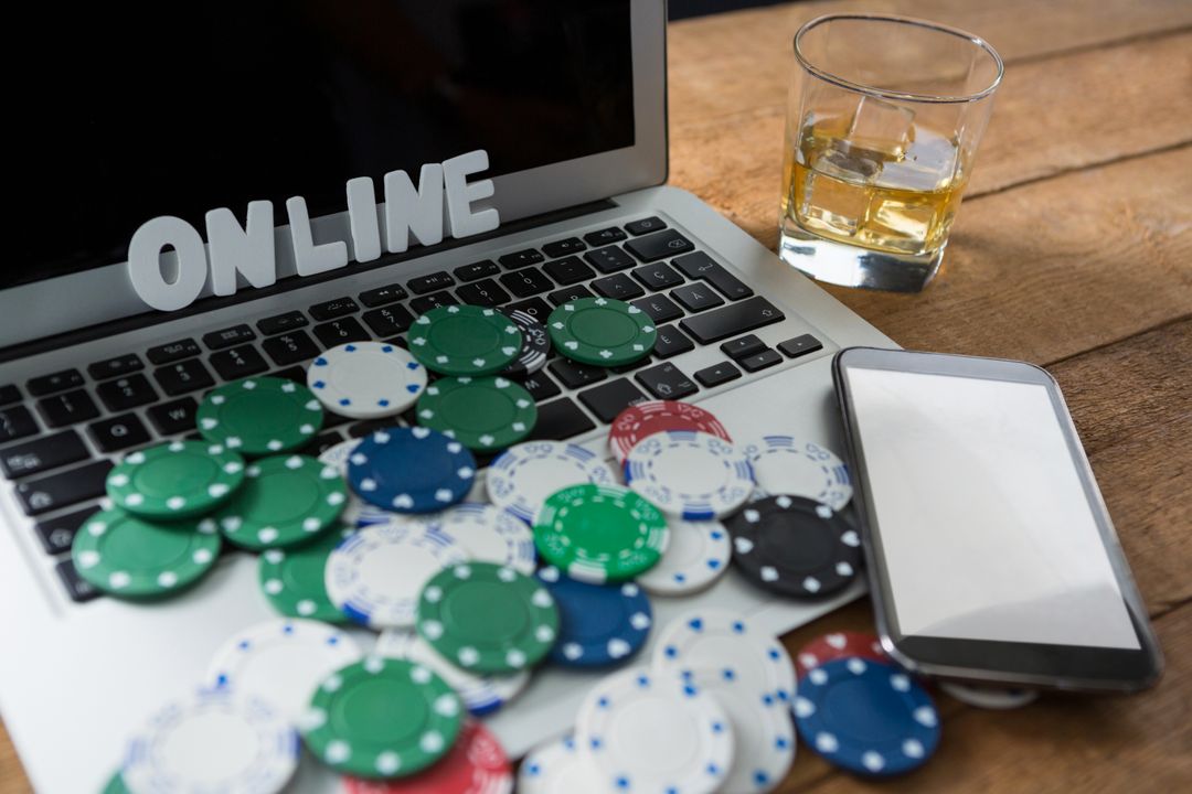 Online Gambling Concept with Poker Chips and Laptop - Free Images, Stock Photos and Pictures on Pikwizard.com