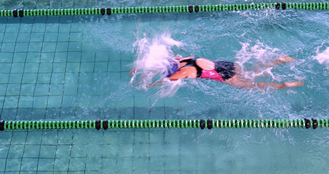 Swimmer in Competitive Swimming Pool Wearing Swim Cap - Free Images, Stock Photos and Pictures on Pikwizard.com