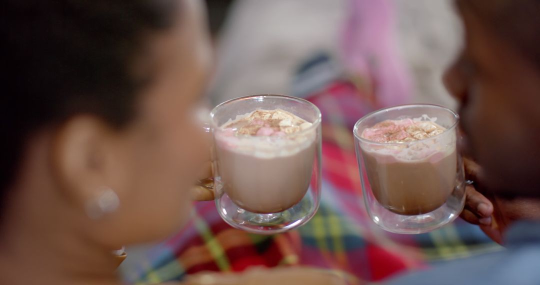 Couple Enjoying Hot Cocoa with Marshmallows in Cozy Setting - Free Images, Stock Photos and Pictures on Pikwizard.com