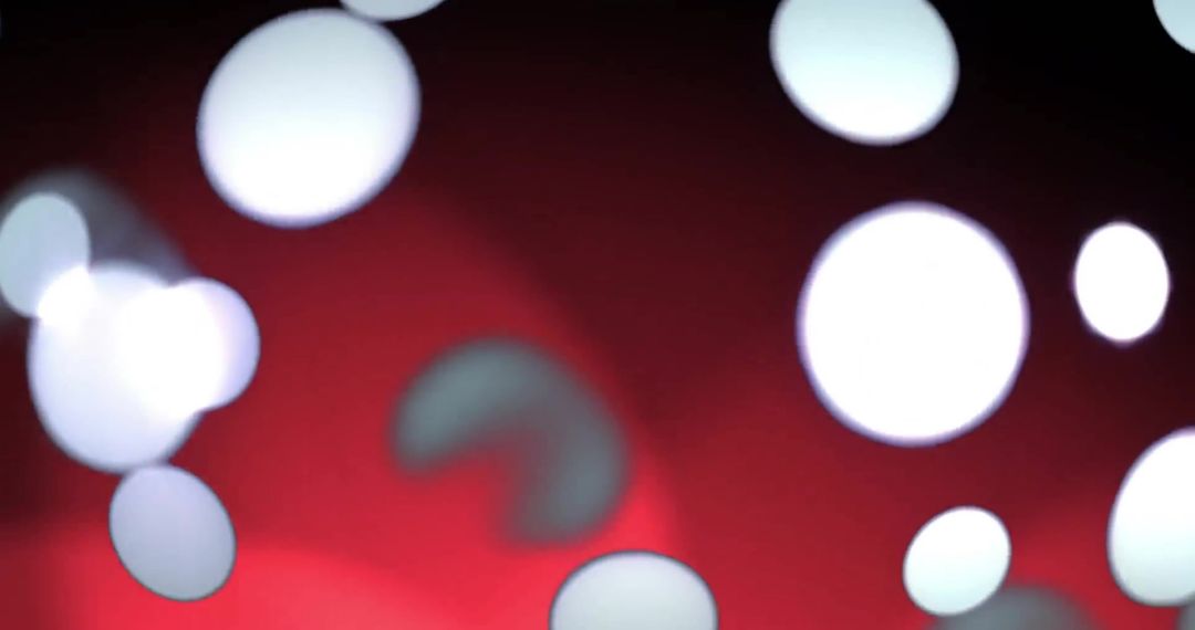 Abstract Glowing Light Spots on Red and Black Background
