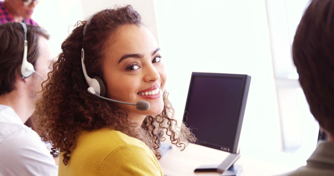 Smiling Female Customer Service Agent in Call Center - Free Images, Stock Photos and Pictures on Pikwizard.com