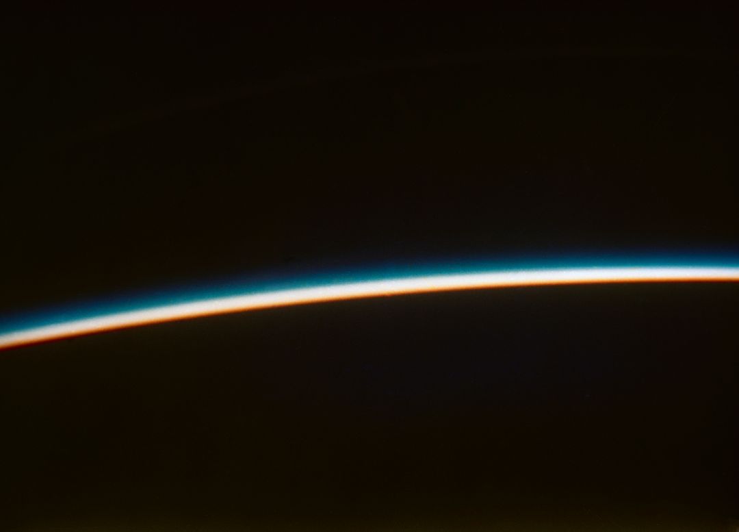 Orbital Sunset from Space by John H. Glenn Jr. in Friendship 7, 1962 - Free Images, Stock Photos and Pictures on Pikwizard.com