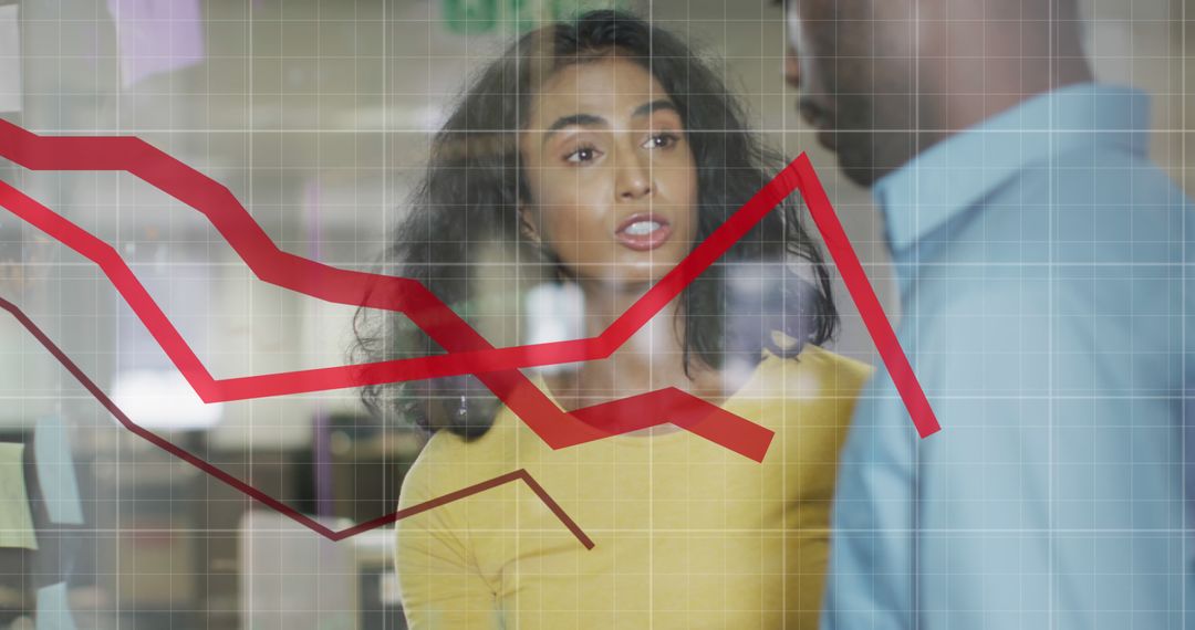 Diverse Colleagues Discussing Business Graphs and Analytics