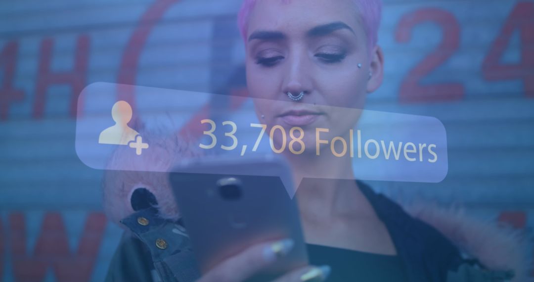 Influencer Viewing Growing Follower Count on Smartphone