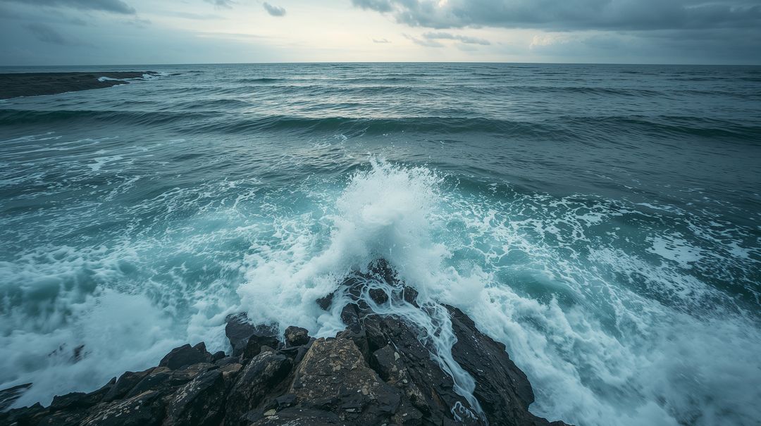 Crashing Waves Hitting Jagged Rocks Under Moody Overcast Sky, Teal Horizon, Coastal Spray