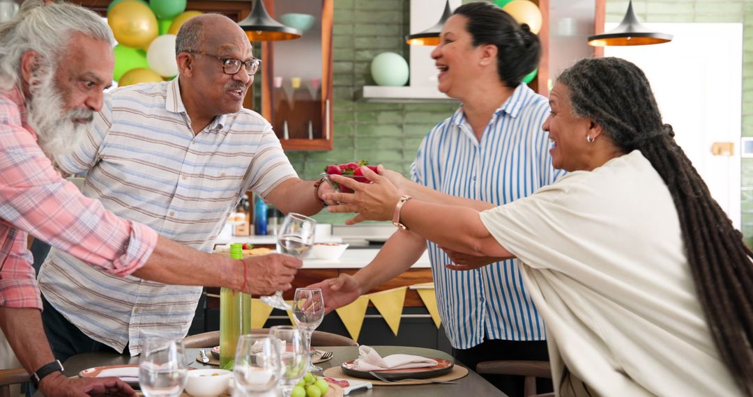 Senior Friends Preparing Dinner Party at Home
