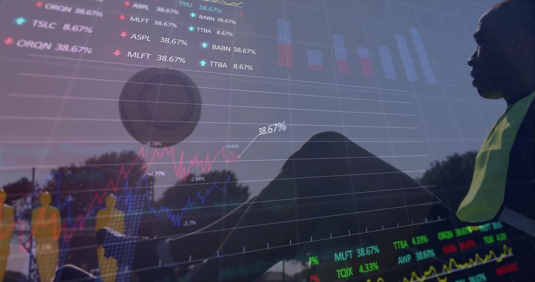 Silhouetted Outdoor Worker with Reflective Vest Overlaid by Financial Charts and Analytics
