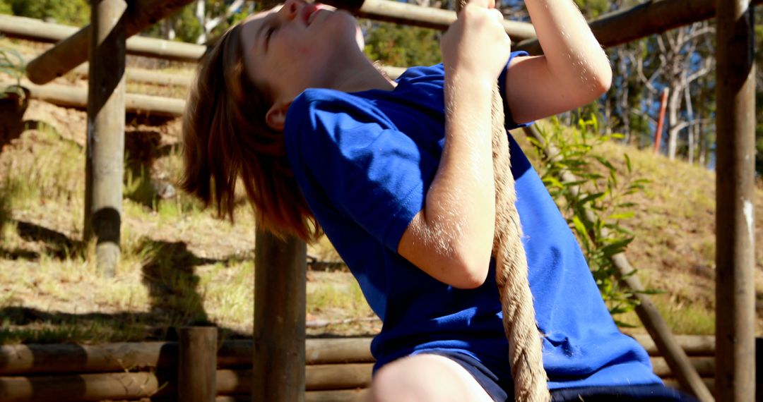 Child Climbing Rope at Outdoor Playground - Free Images, Stock Photos and Pictures on Pikwizard.com