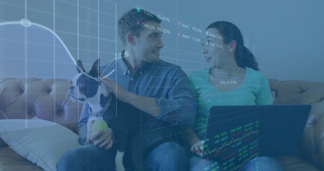 Couple with Laptop Analyzing Stock Market Data at Home with Pet Dog