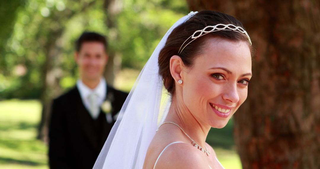 Happy Bride Smiling Outdoors on Wedding Day - Free Images, Stock Photos and Pictures on Pikwizard.com