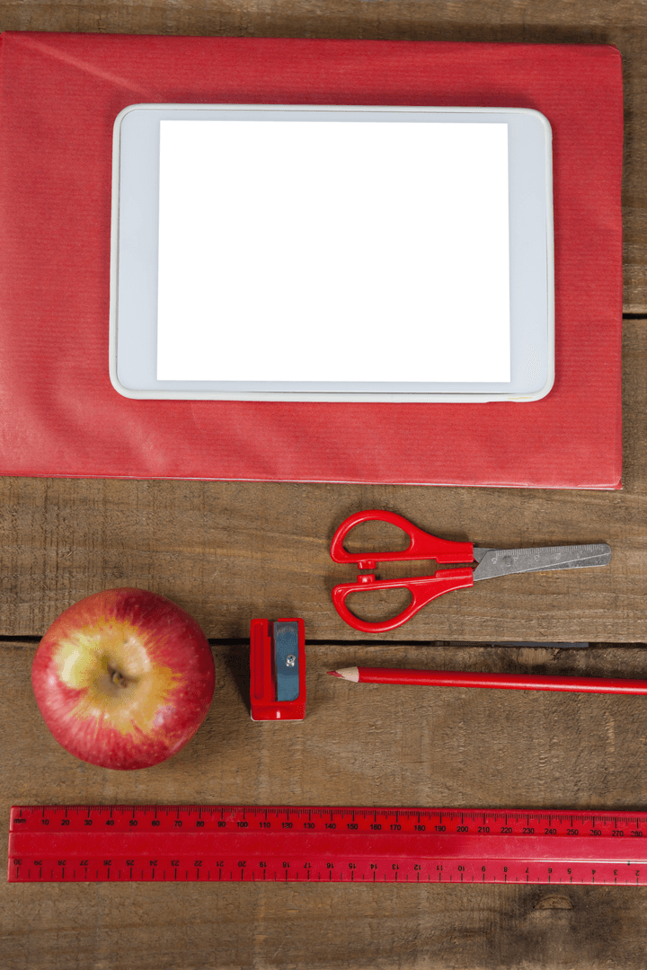 Transparent School Supplies Set on Wooden Table with Digital Tablet