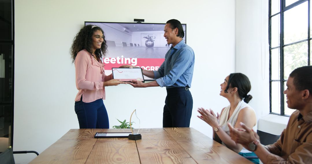 Team Celebration and Recognition in Modern Office Setting