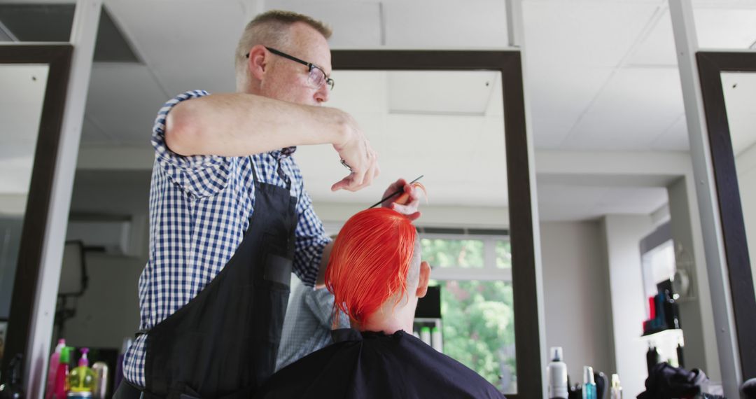 Professional Barber Styling Vibrant Red Hair in Modern Salon - Free Images, Stock Photos and Pictures on Pikwizard.com