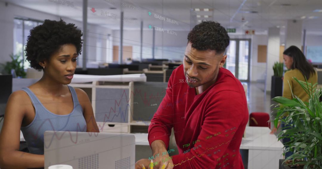 Diverse Colleagues Analyzing Data with Digital Diagrams