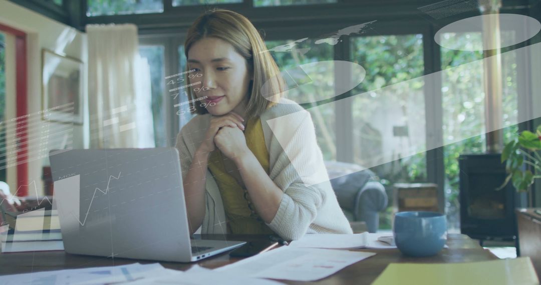 Caucasian Woman Analyzing Financial Data on Laptop at Home
