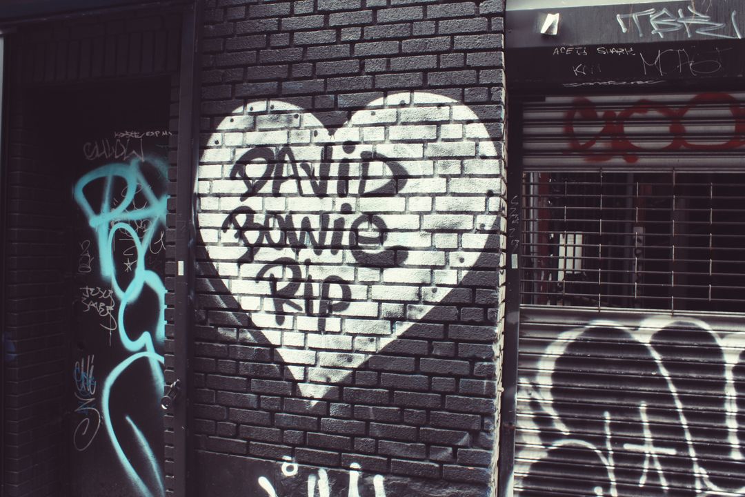 Heart-Shaped Graffiti on Brick Wall, Tribute to David Bowie - Free Images, Stock Photos and Pictures on Pikwizard.com