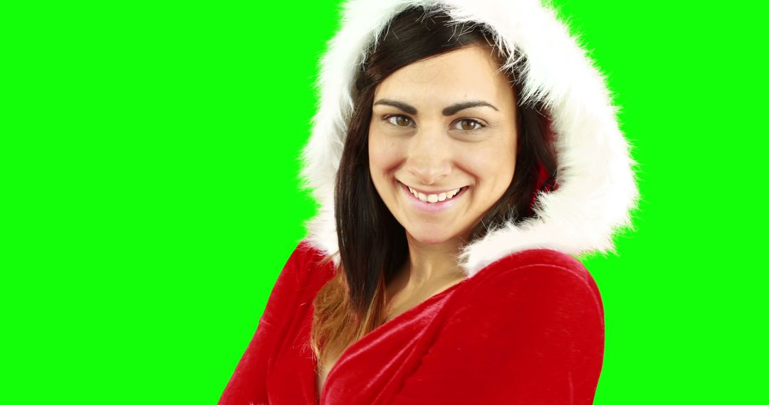 Smiling Woman in Santa Claus Outfit with Fur Trim on Green Background - Free Images, Stock Photos and Pictures on Pikwizard.com