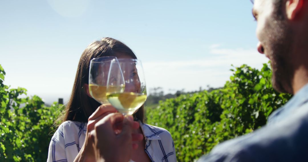 Joyful Wine Toast in Scenic Vineyard