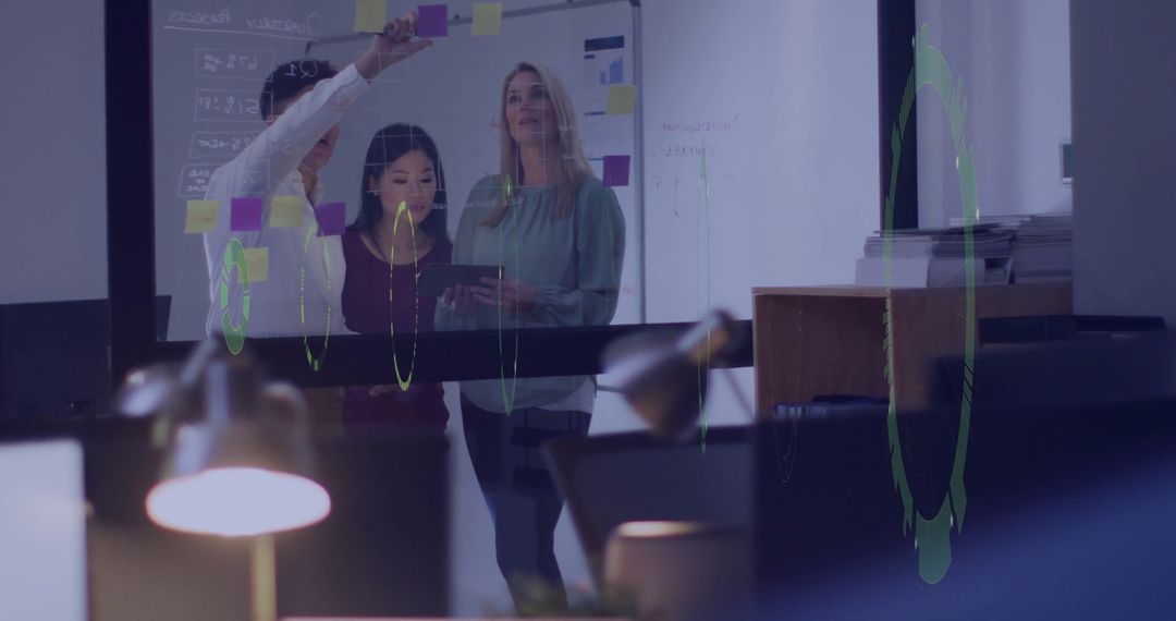 Modern Office Team Collaborating with Digital Data Visualization Overlay