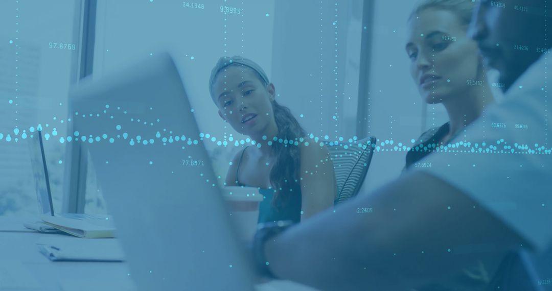 Diverse Team Analyzing Financial Data for Business Insights