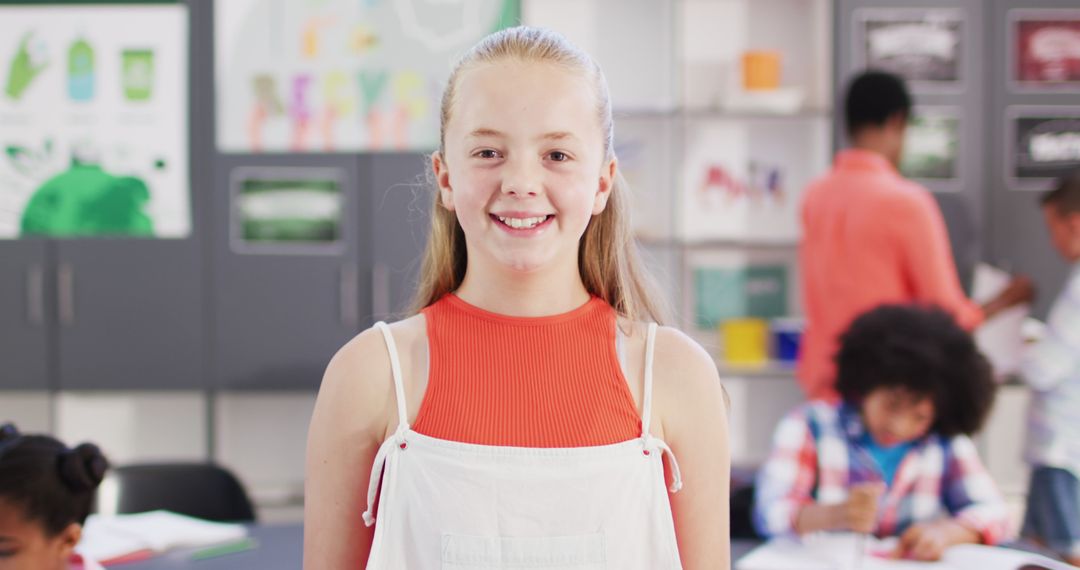 Smiling Caucasian Schoolgirl in Classroom with Diverse Students - Free Images, Stock Photos and Pictures on Pikwizard.com