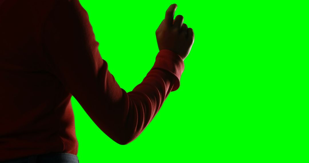 Person Gesturing in Front of Green Screen - Free Images, Stock Photos and Pictures on Pikwizard.com