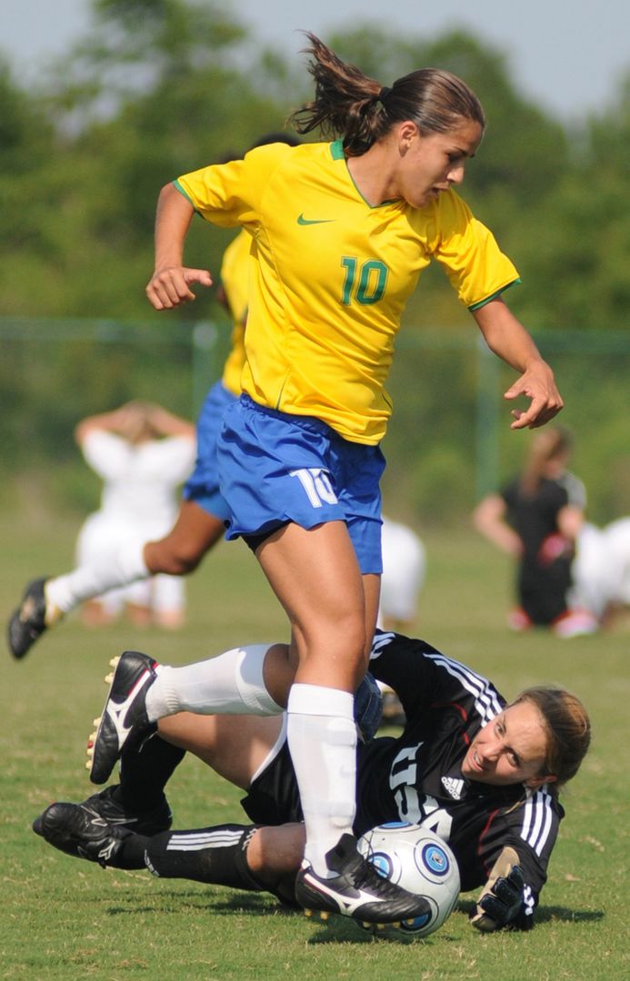 Female Soccer Players Competing During Intense Match - Free Images, Stock Photos and Pictures on Pikwizard.com
